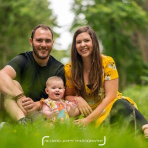Sarah and Tom and Ella Rose in woodland