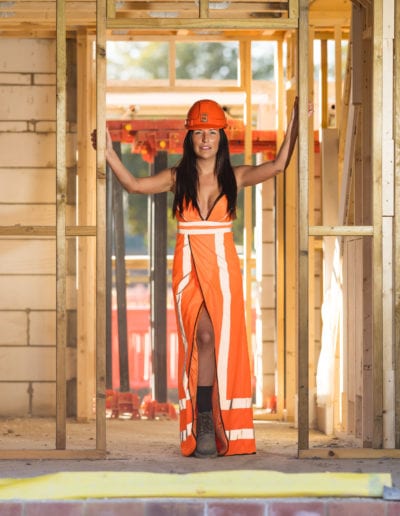 Kelly Cartwright - Core Recruiter - in a bright orange and reflective Hi Viz Dress